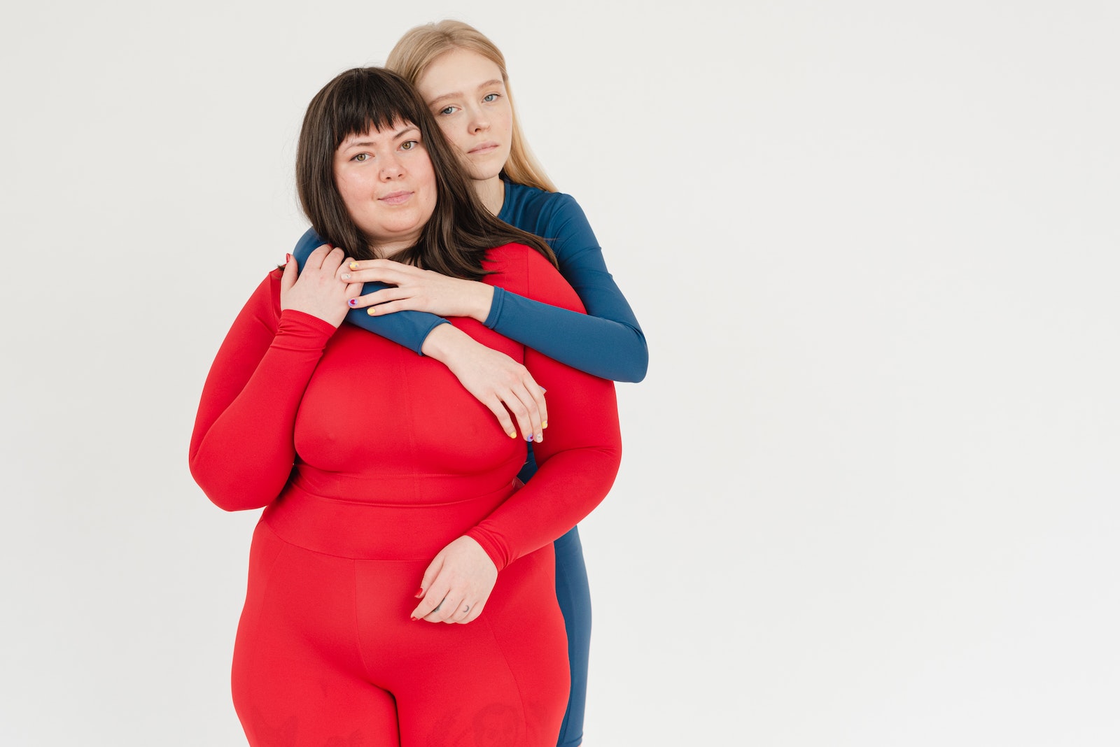 Tender women with different body types in studio
