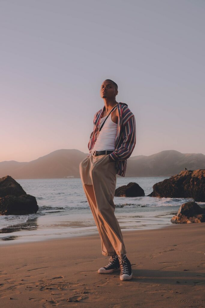 Man Standing on Seashore
