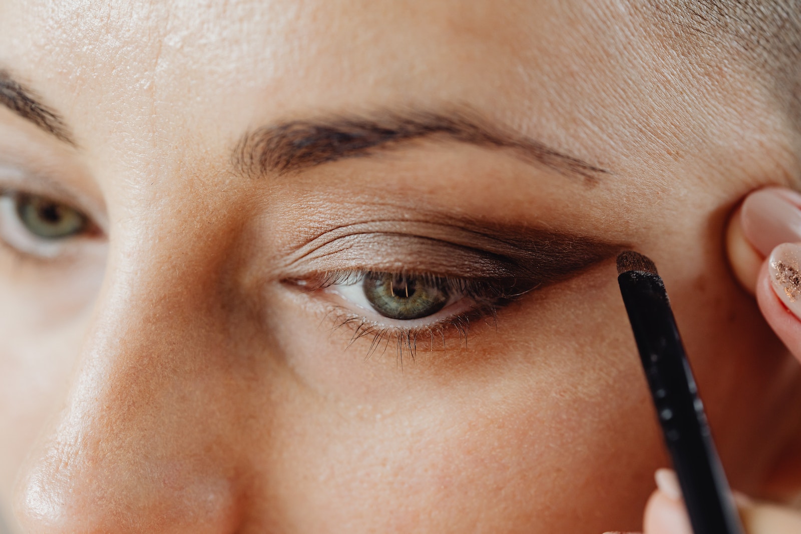 A Woman Applying Eyeshadow