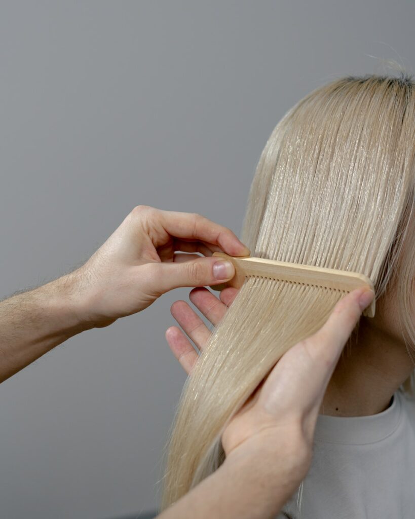 Hand Combing the Blonde Hair