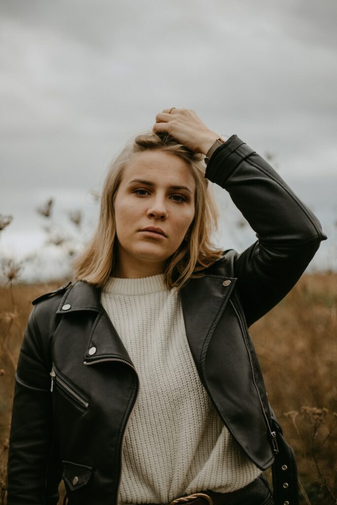 woman in black leather jacket