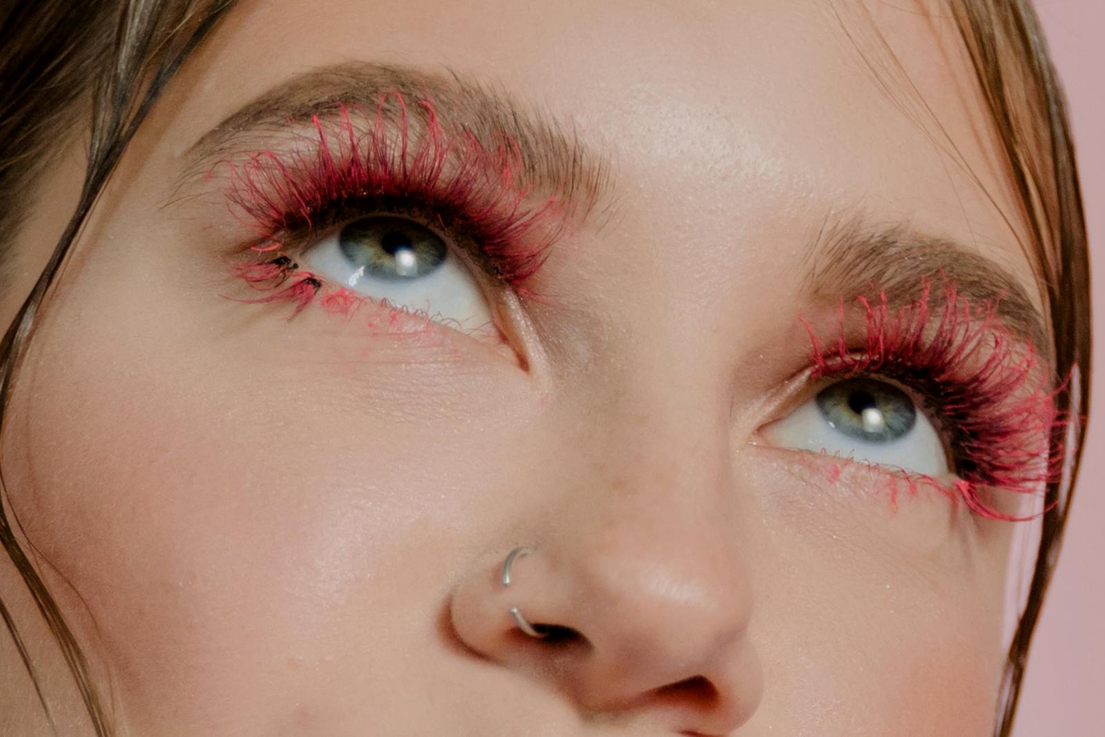 A Close-Up Shot of a Woman Wearing Eye Makeup