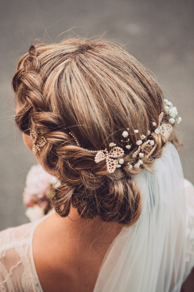 a woman with a wedding hair comb in her hair
