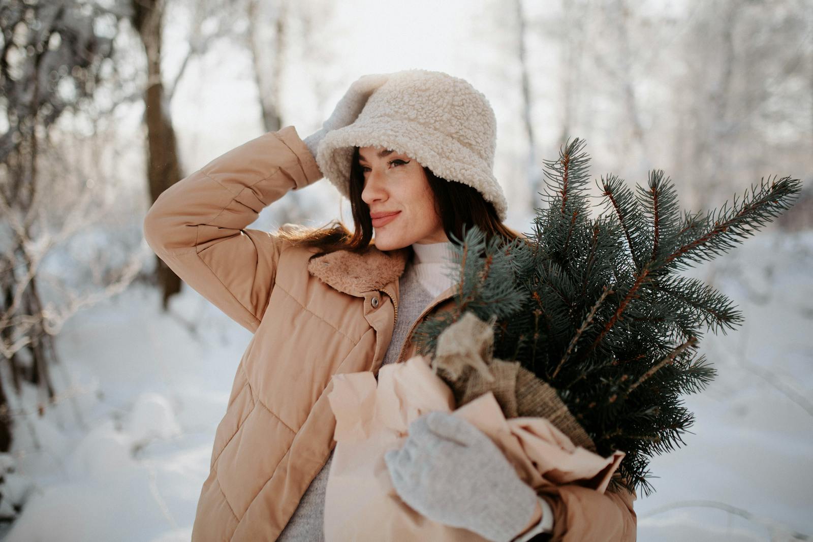 Beautiful Woman With Christmas Tree on Winter Day