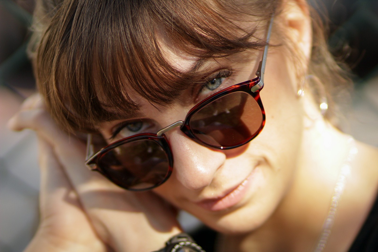 women's black and red tortoiseshell-framed sunglasses