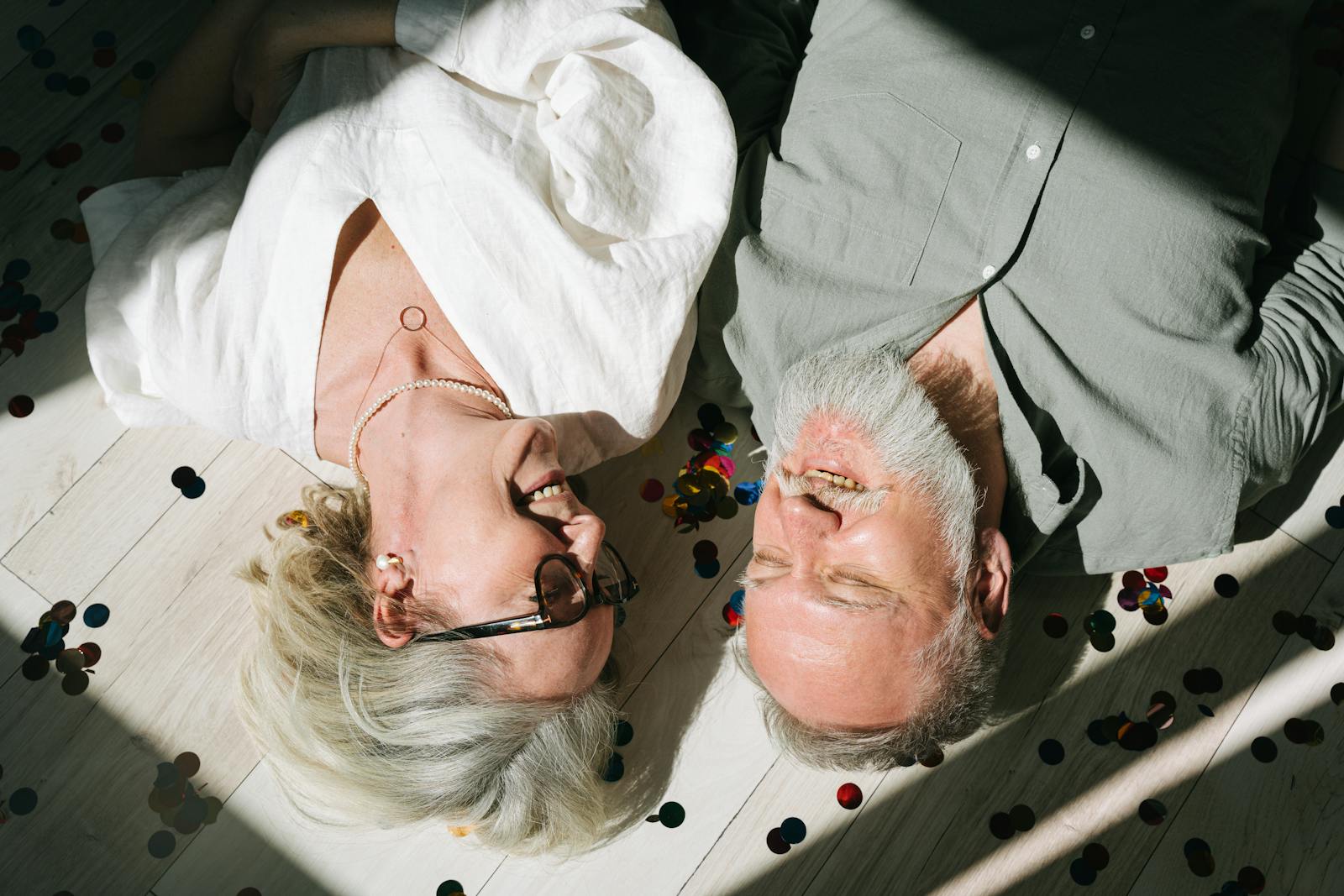 Smiling Couple Lying on the Floor