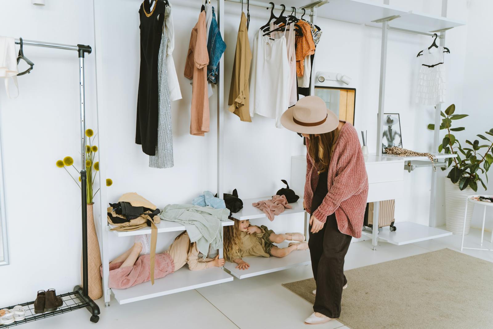 A Woman with Kids in a Wardrobe